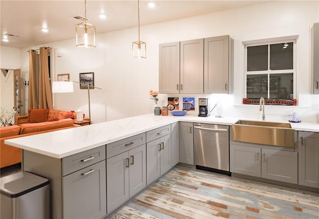 623-25 Louisa St, New Orleans, LA 70117 - kitchen with dishwasher, gray cabinets, a peninsula, decorative light fixtures, and recessed lighting