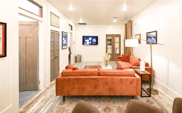 623-25 Louisa St, New Orleans, LA 70117 - living room with wood finished floors and recessed lighting