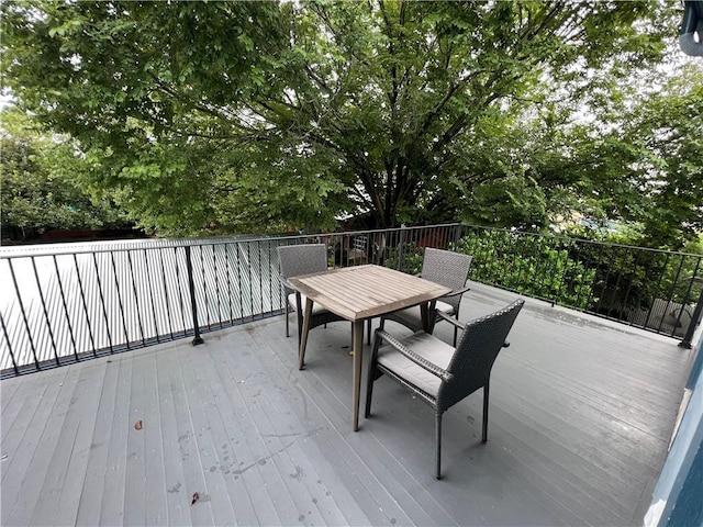 623-25 Louisa St, New Orleans, LA 70117 - wooden deck with outdoor dining space