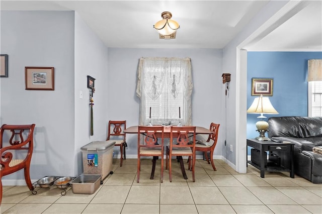 603 E Manley Ave, Metairie, LA 70001 - tiled dining space with baseboards
