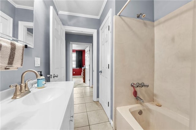 603 E Manley Ave, Metairie, LA 70001 - bathroom with tile patterned flooring, crown molding, vanity, and shower / tub combination