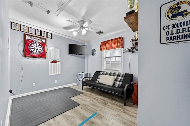 603 E Manley Ave, Metairie, LA 70001 - sitting room with ceiling fan and wood finished floors
