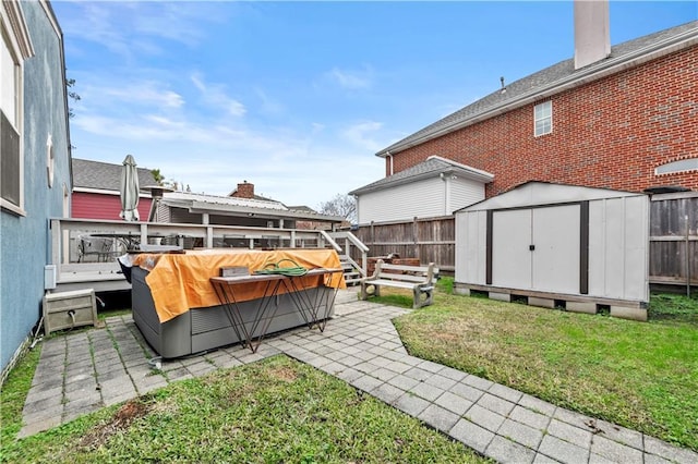 603 E Manley Ave, Metairie, LA 70001 - fenced backyard with a storage shed and a patio area
