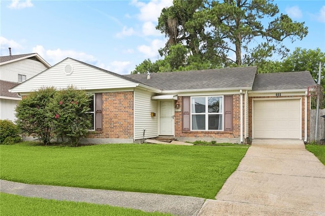 230 Brett Dr, Gretna, LA 70056 - ranch-style home featuring an attached garage, brick siding, concrete driveway, and a front lawn