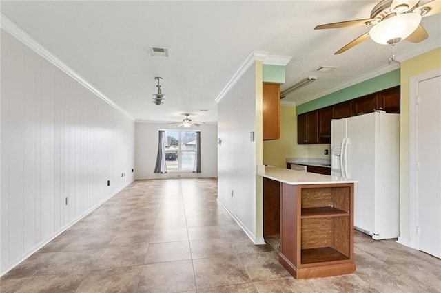 230 Brett Dr, Gretna, LA 70056 - kitchen featuring white refrigerator with ice dispenser, ceiling fan, crown molding, light countertops, and open floor plan