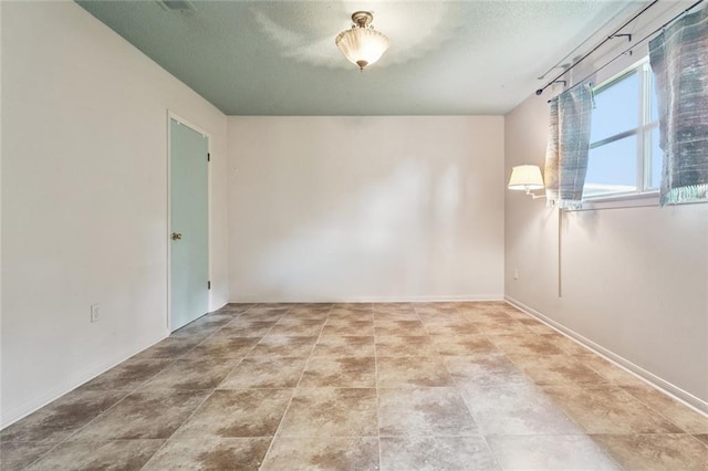 230 Brett Dr, Gretna, LA 70056 - unfurnished room with a textured ceiling and baseboards