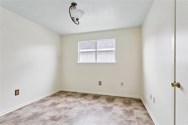 230 Brett Dr, Gretna, LA 70056 - spare room featuring a textured ceiling and baseboards