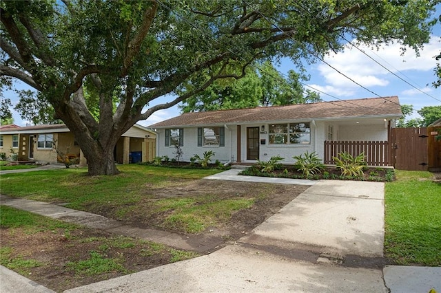 8853 26th St, Metairie, LA 70003 - single story home with brick siding