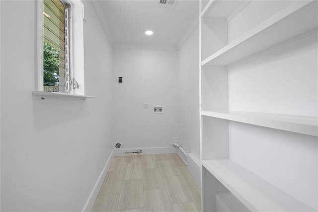 8853 26th St, Metairie, LA 70003 - laundry area featuring hookup for an electric dryer, hookup for a washing machine, and recessed lighting