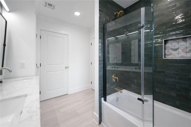 8853 26th St, Metairie, LA 70003 - full bath featuring shower / bath combination with glass door, recessed lighting, and vanity