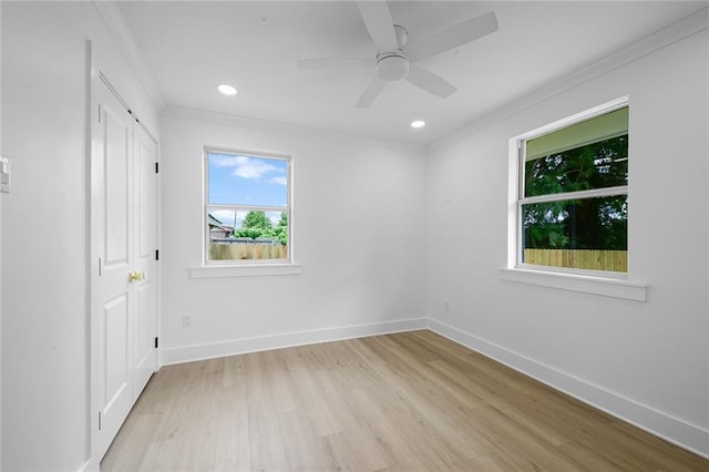 8853 26th St, Metairie, LA 70003 - unfurnished bedroom with crown molding, light wood finished floors, recessed lighting, and a ceiling fan