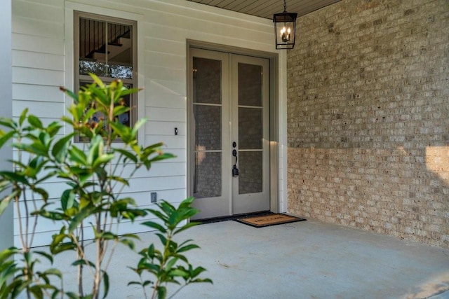 5053 Twin River Pl, Covington, LA 70433 - view of exterior entry featuring french doors