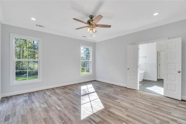5028 Twin River Pl, Covington, LA 70433 - spare room with a ceiling fan, light wood finished floors, crown molding, and recessed lighting