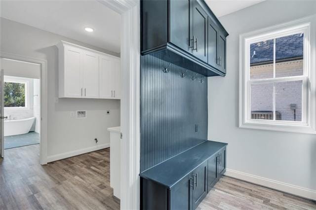 5028 Twin River Pl, Covington, LA 70433 - mudroom with light wood-style flooring and recessed lighting