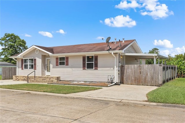 1403 W First St, Belle Chasse, LA 70037 - single story home featuring concrete driveway and a carport