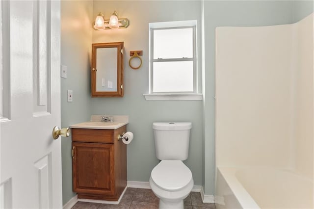 1403 W First St, Belle Chasse, LA 70037 - bathroom featuring vanity, tile patterned floors, and bathing tub / shower combination