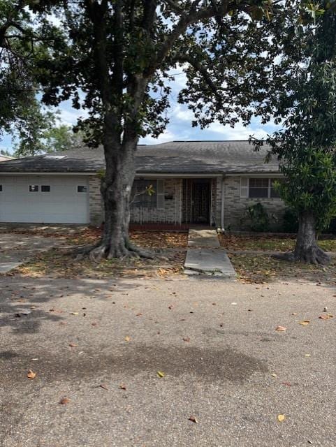 305 Lilac St, Metairie, LA 70005 - view of front of property featuring stone siding