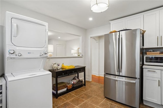 618-24 Fern St, New Orleans, LA 70118 - laundry area with stacked washer / dryer and recessed lighting