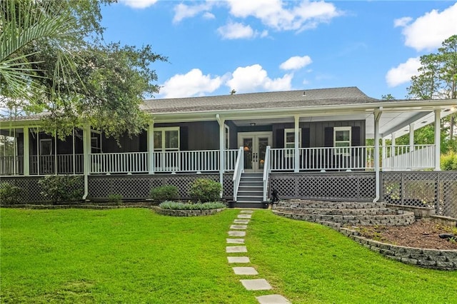 59246 Cypress Bayou Ln, Lacombe, LA 70445 - country-style home with a front yard, french doors, and a sunroom