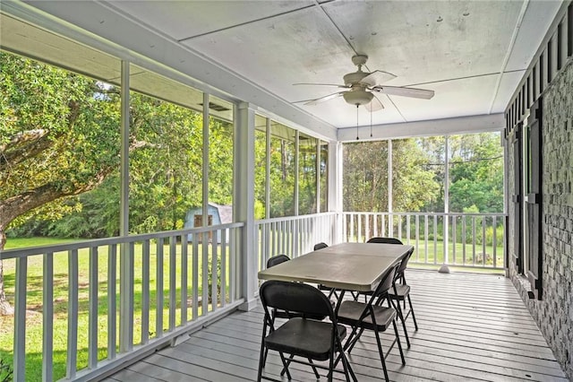 59246 Cypress Bayou Ln, Lacombe, LA 70445 - sunroom / solarium with ceiling fan and outdoor dining space