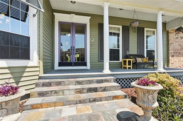 8 Oak Tree Dr, Slidell, LA 70458 - entrance to property with covered porch and french doors