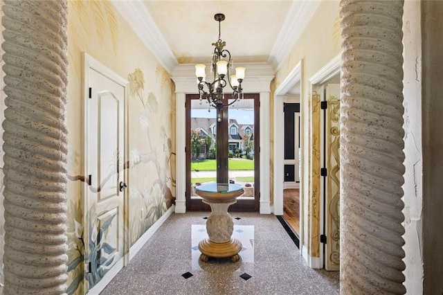 8 Oak Tree Dr, Slidell, LA 70458 - entrance foyer with french doors, a chandelier, ornamental molding, and granite floors