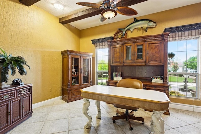8 Oak Tree Dr, Slidell, LA 70458 - office area featuring a textured wall, light tile patterned flooring, beam ceiling, and a ceiling fan