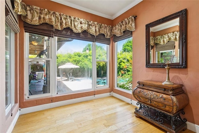 8 Oak Tree Dr, Slidell, LA 70458 - interior space with wood finished floors, ornamental molding, and healthy amount of natural light