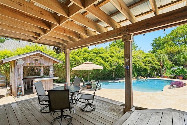 8 Oak Tree Dr, Slidell, LA 70458 - wooden deck with an outdoor pool and a patio area