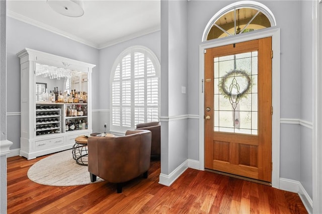 1107 Meadow Ct, Mandeville, LA 70448 - entrance foyer with plenty of natural light, wood finished floors, and ornamental molding