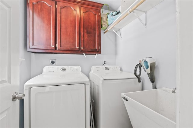 1107 Meadow Ct, Mandeville, LA 70448 - laundry area featuring cabinet space and washing machine and dryer