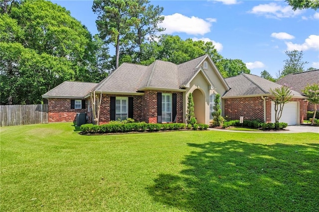1107 Meadow Ct, Mandeville, LA 70448 - view of front of property with a garage, brick siding, driveway, and stucco siding