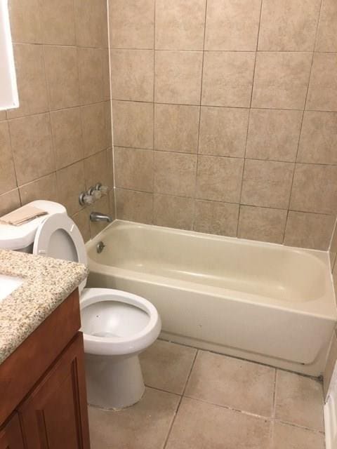 520 Emile Ave, Westwego, LA 70094 - full bathroom featuring tile patterned floors, vanity, and  shower combination