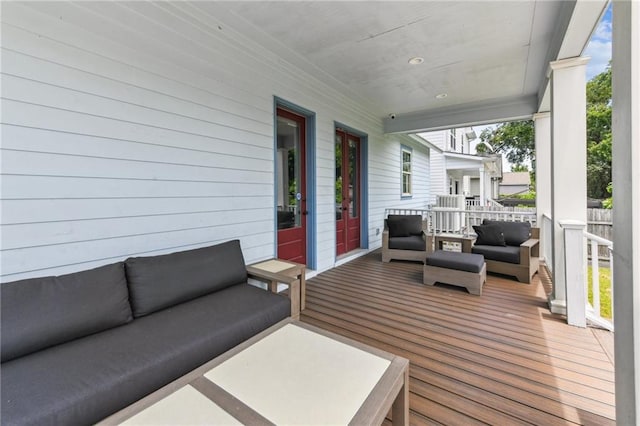230 26th St, New Orleans, LA 70124 - wooden terrace featuring an outdoor living space and french doors