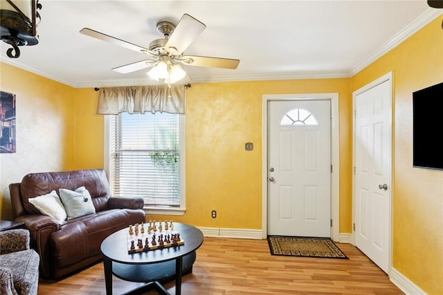 257 Cherokee St Unit 3, New Orleans, LA 70118 - entryway with light wood-type flooring, crown molding, and a ceiling fan