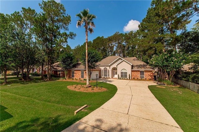 2212 Prairie Ct, Mandeville, LA 70448 - mediterranean / spanish-style home with driveway and a garage