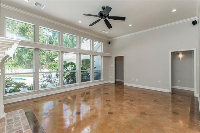2212 Prairie Ct, Mandeville, LA 70448 - unfurnished living room featuring a ceiling fan, a towering ceiling, ornamental molding, and recessed lighting