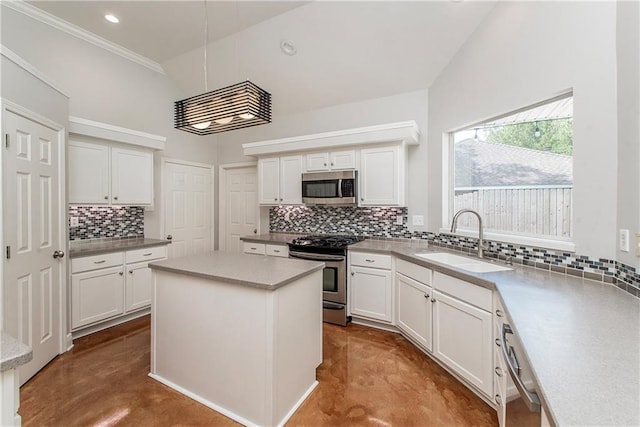 2212 Prairie Ct, Mandeville, LA 70448 - kitchen with stainless steel appliances, finished concrete flooring, decorative backsplash, white cabinetry, and recessed lighting