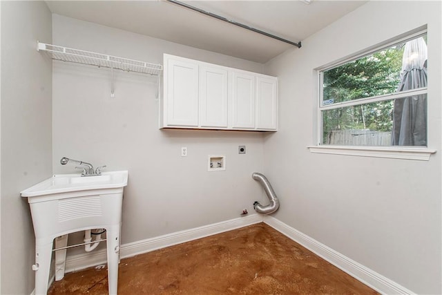 2212 Prairie Ct, Mandeville, LA 70448 - laundry room featuring hookup for a washing machine, hookup for an electric dryer, cabinet space, and gas dryer hookup