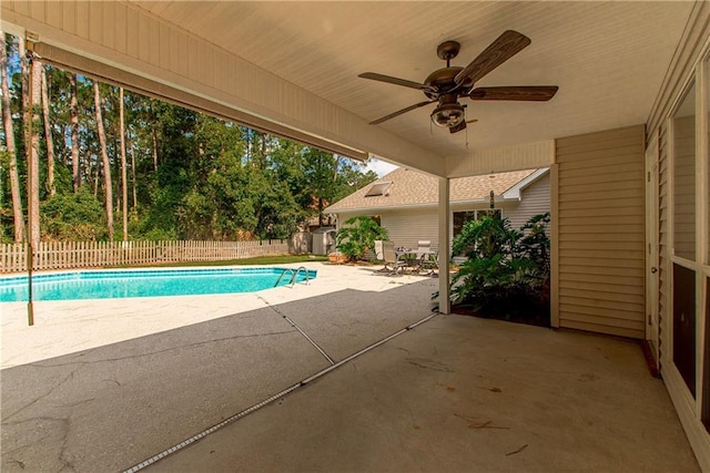 2212 Prairie Ct, Mandeville, LA 70448 - view of swimming pool featuring a patio area, a fenced backyard, and a ceiling fan