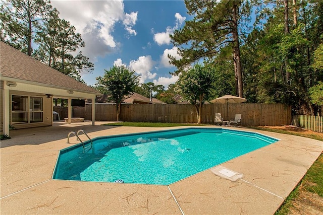 2212 Prairie Ct, Mandeville, LA 70448 - view of swimming pool with a patio area and a fenced backyard