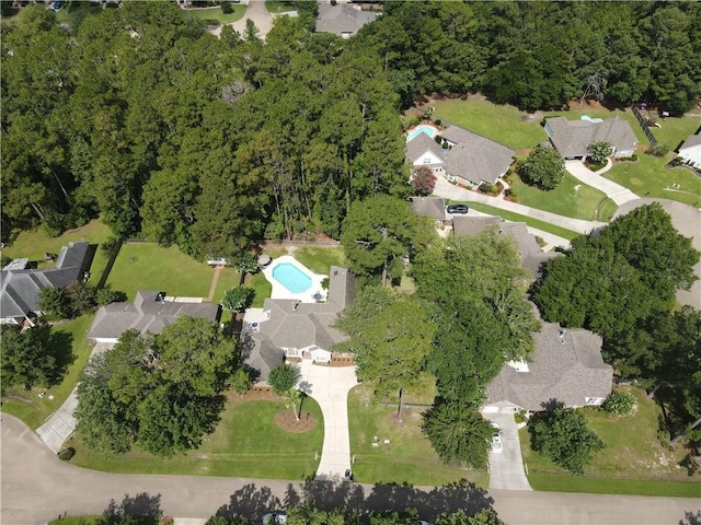 2212 Prairie Ct, Mandeville, LA 70448 - aerial view of property's location with a pool area and nearby suburban area