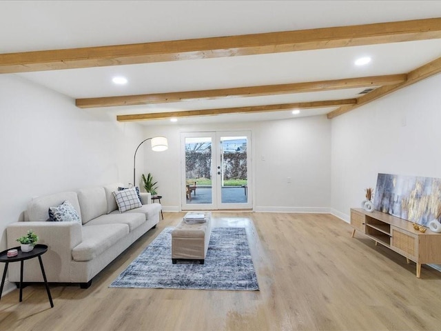 1340 Nursery Pl, Metairie, LA 70005 - living area featuring recessed lighting, beamed ceiling, wood finished floors, and french doors