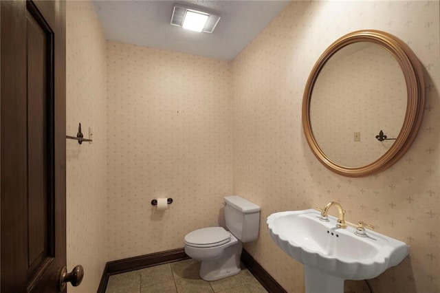 3541 Alan St, Metairie, LA 70002 - half bath featuring a sink and tile patterned floors