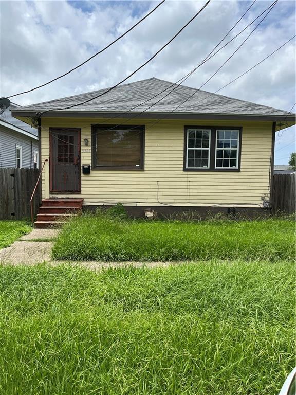 5328 Eastern St, New Orleans, LA 70122 - view of front of house featuring roof with shingles and entry steps