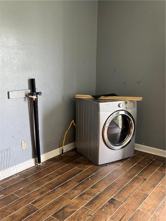 5328 Eastern St, New Orleans, LA 70122 - laundry area with washer / dryer and wood finish floors