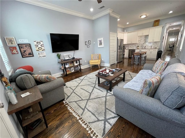 2272 N Robertson St, New Orleans, LA 70117 - living room featuring dark wood-style floors, recessed lighting, crown molding, and ceiling fan