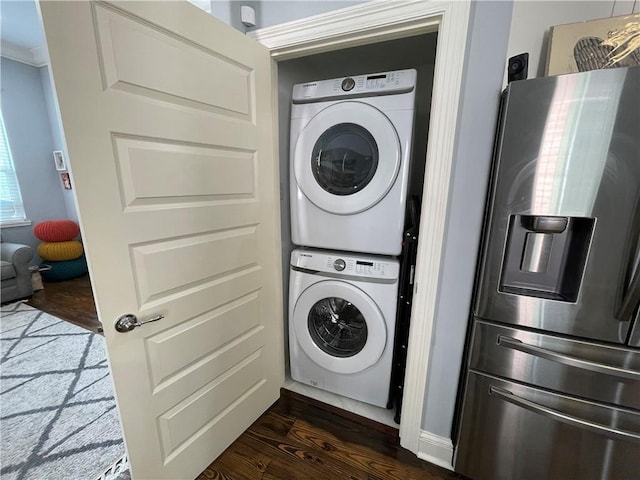 2272 N Robertson St, New Orleans, LA 70117 - washroom with stacked washer / drying machine and dark wood-type flooring