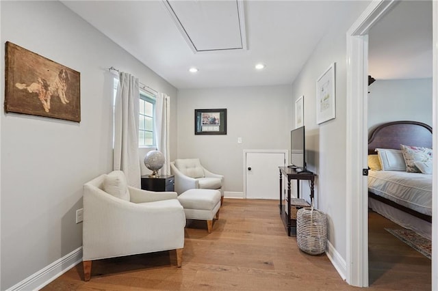 9 Hennessey Ct, River Ridge, LA 70123 - sitting room featuring light wood finished floors, recessed lighting, and attic access