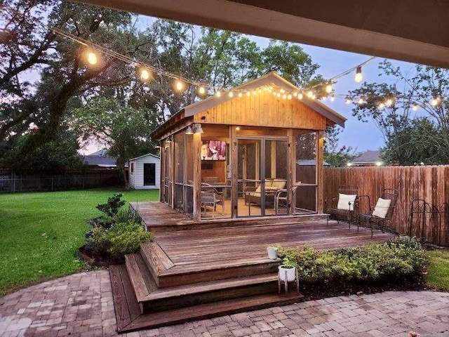 9 Hennessey Ct, River Ridge, LA 70123 - view of shed featuring a fenced backyard and a sunroom